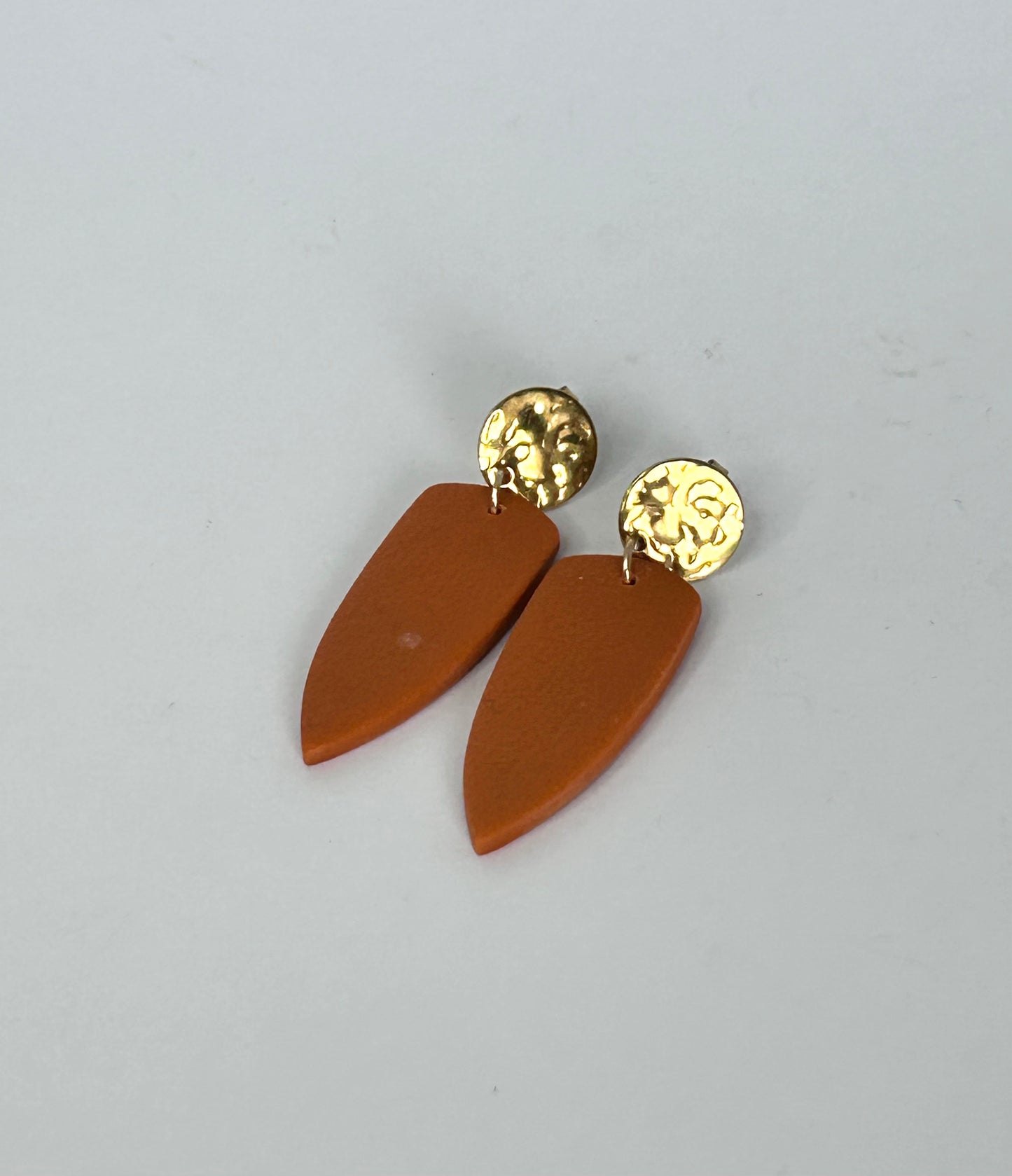 The Shield Burnt Orange